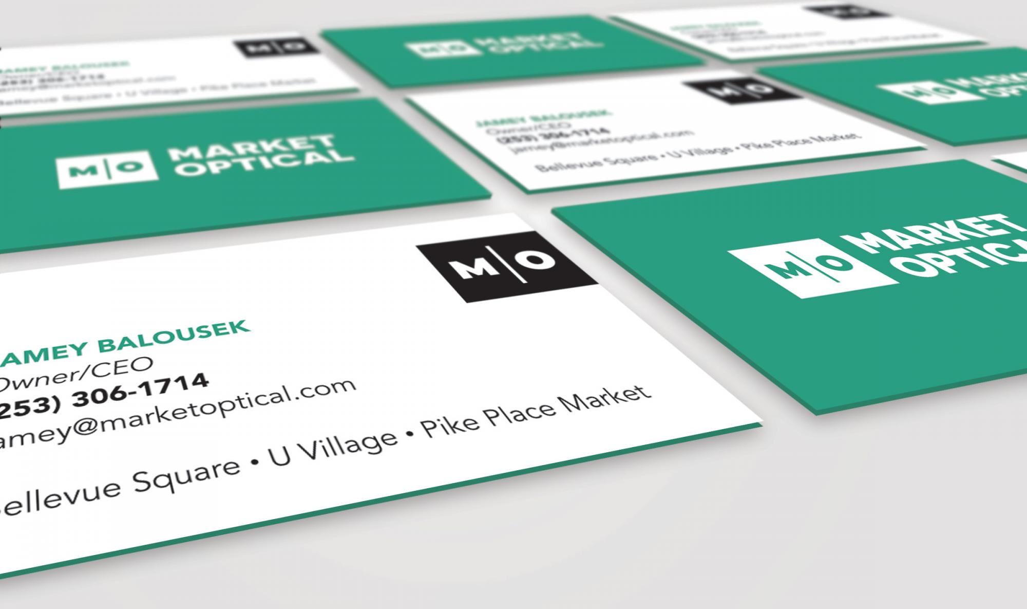 Perspective view of Market Optical business cards front and back