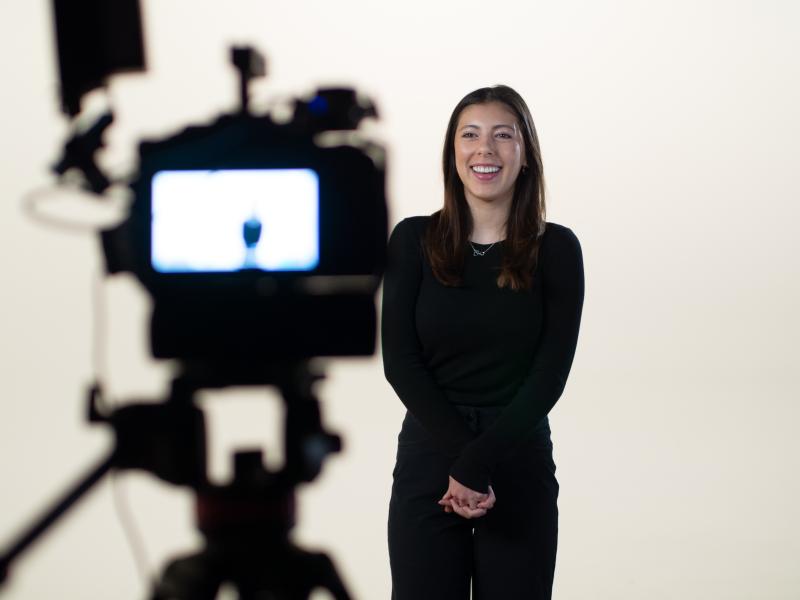 Behind the scenes shot of caregiver giving career testimonial
